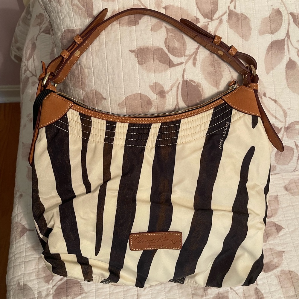 MAKE AN OFFER. 
Dooney & Bourke handbag